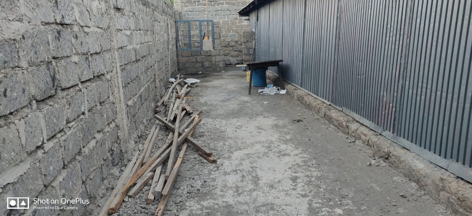 The passage between the kitchen and the store room